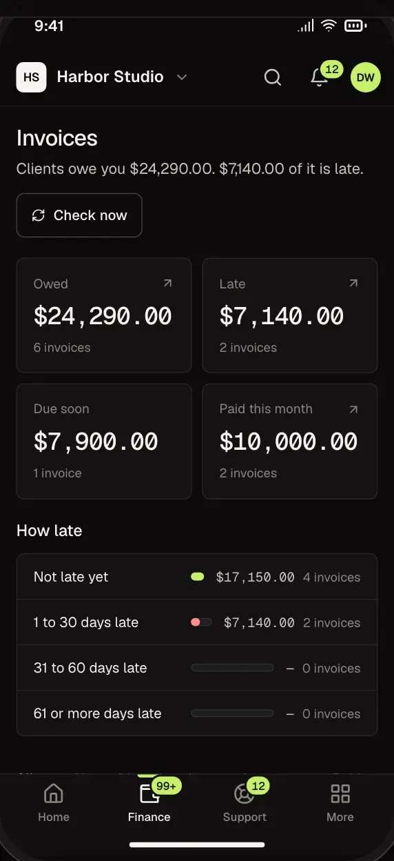 The invoice list, showing which invoices are late, due or paid, on an iPad held sideways
